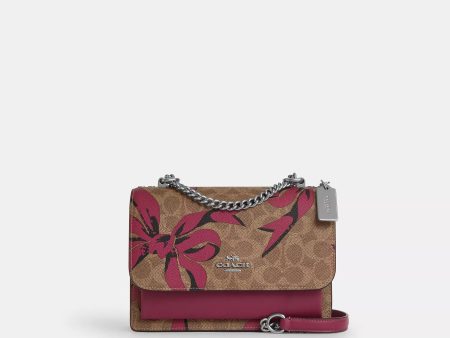 Coach Outlet Klare Crossbody Bag In Signature Canvas With Bow Print For Sale